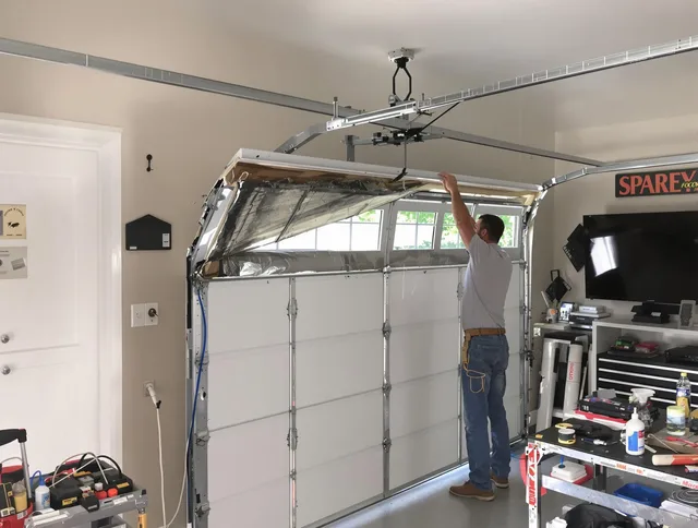 Garage door section replacement by Westwood Garage Door Repair in Westwood