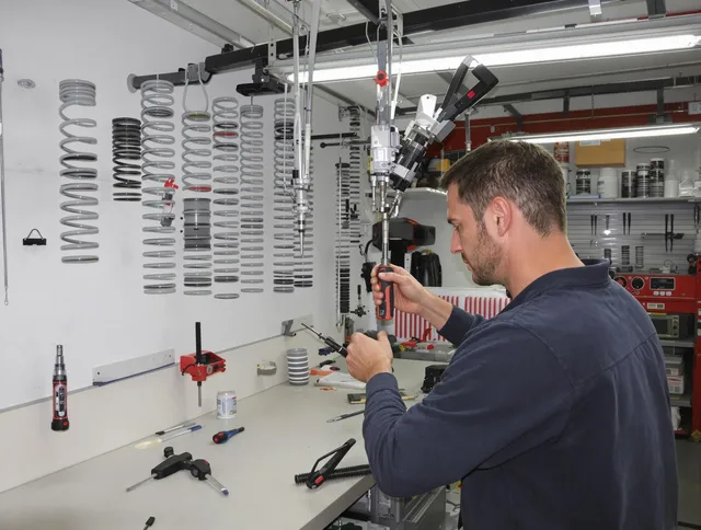 Westwood Garage Door Repair safety certified technician performing precision spring replacement in Westwood